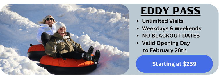 a person that is sitting in the snow